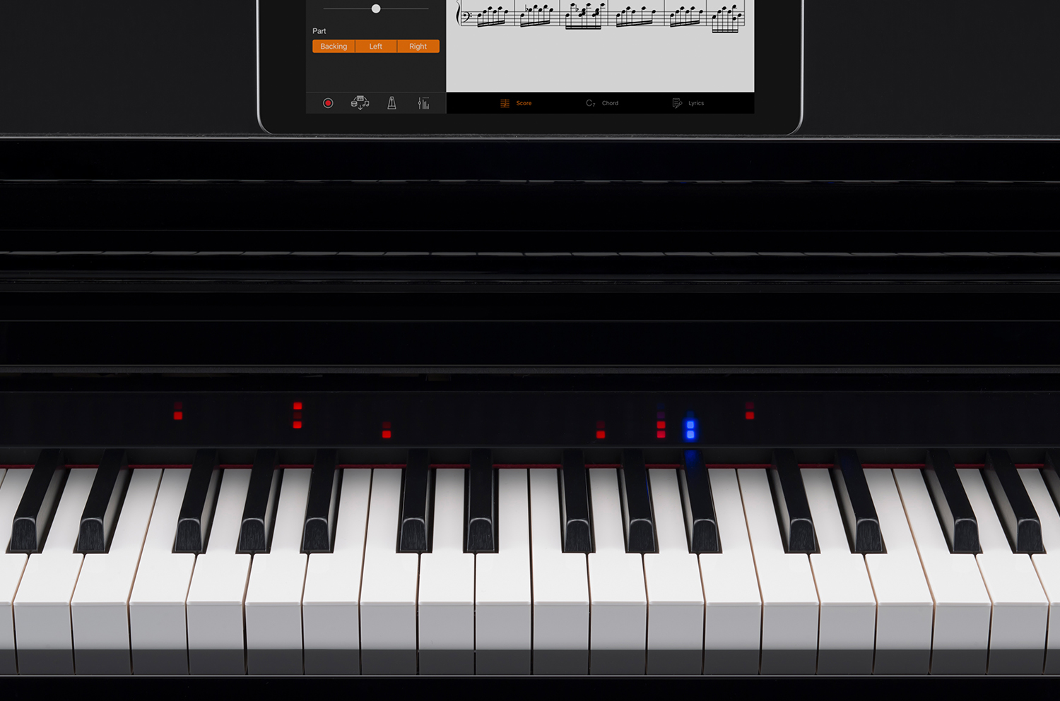 Digital piano keyboard with integrated LCD display featuring sheet music and control interface, perfect for advanced