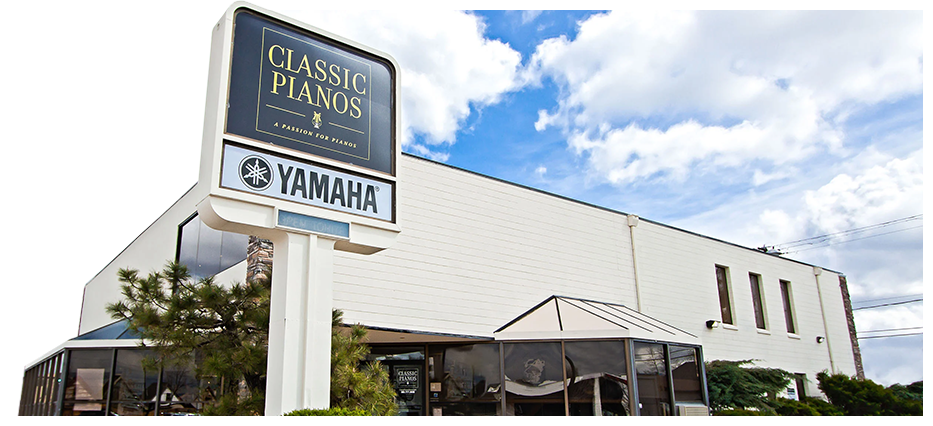Classic Pianos Denver showroom exterior with Yamaha signage, showcasing premium acoustic and digital pianos.