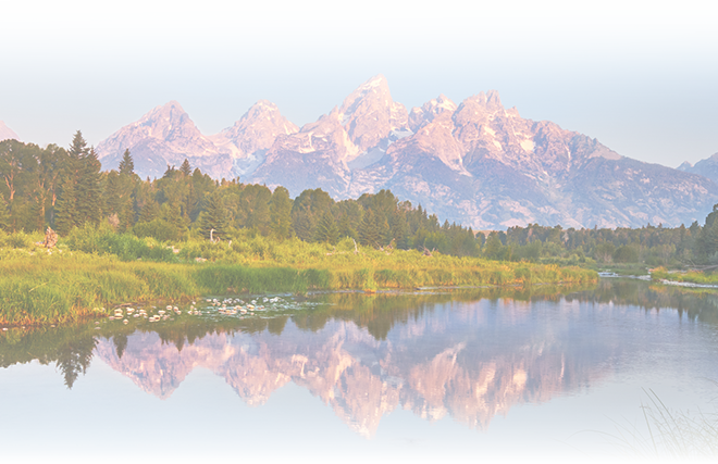 Alt text: Majestic mountain landscape reflecting on water, featured on Classic Pianos Denver for an elegant ambiance.