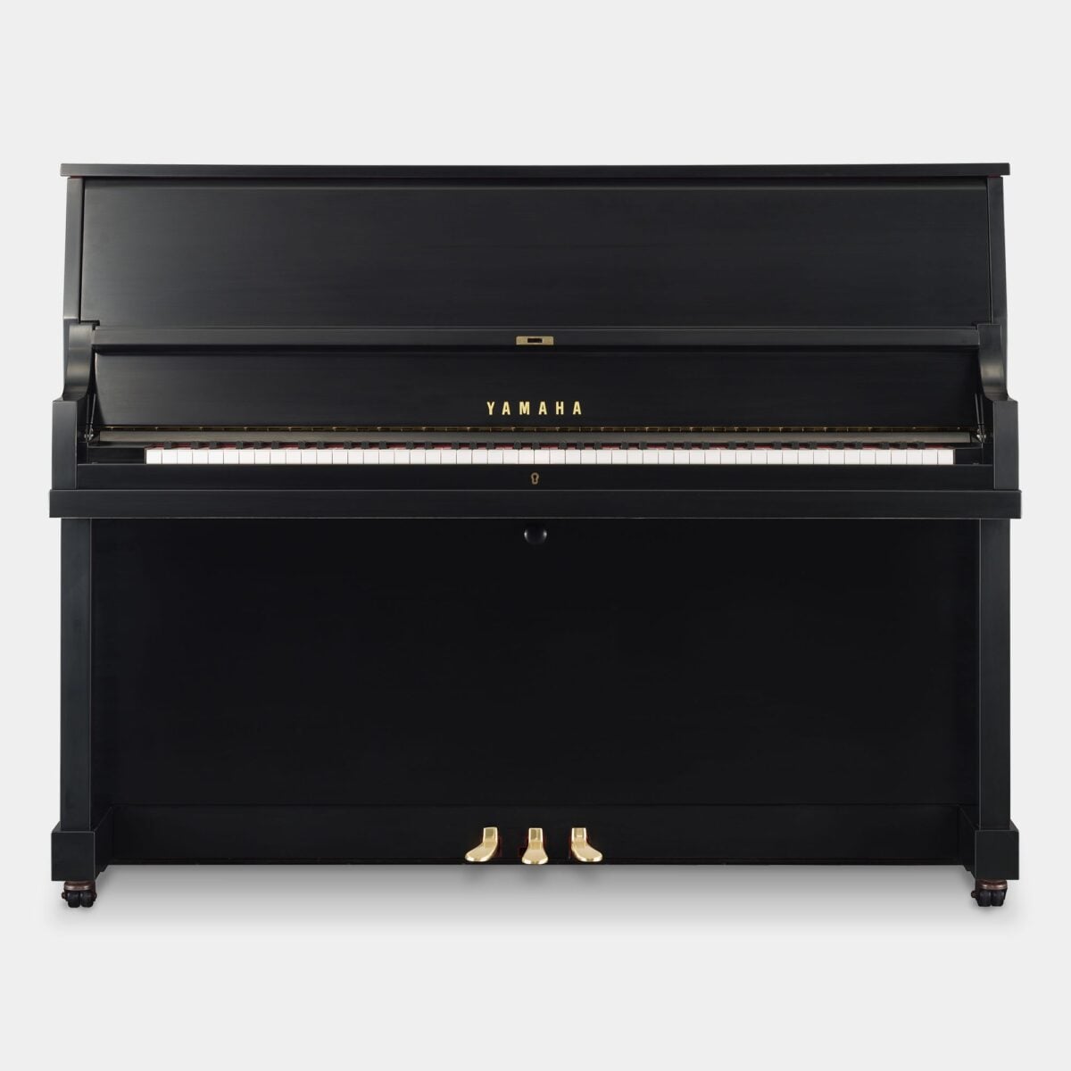 Yamaha U Series upright piano, polished ebony finish, featuring superior tone and touch. Ideal for professional studios.
