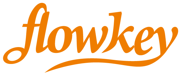 Flowkey logo in orange script font, representing piano learning software for enthusiasts and musicians.