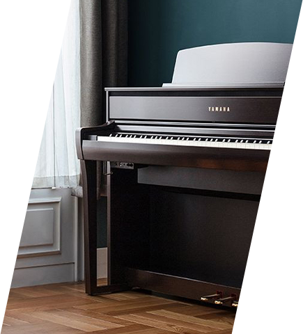 Yamaha Clavinova digital piano in polished ebony finish, showcased in elegant interior, available at Classic Pianos Denver.